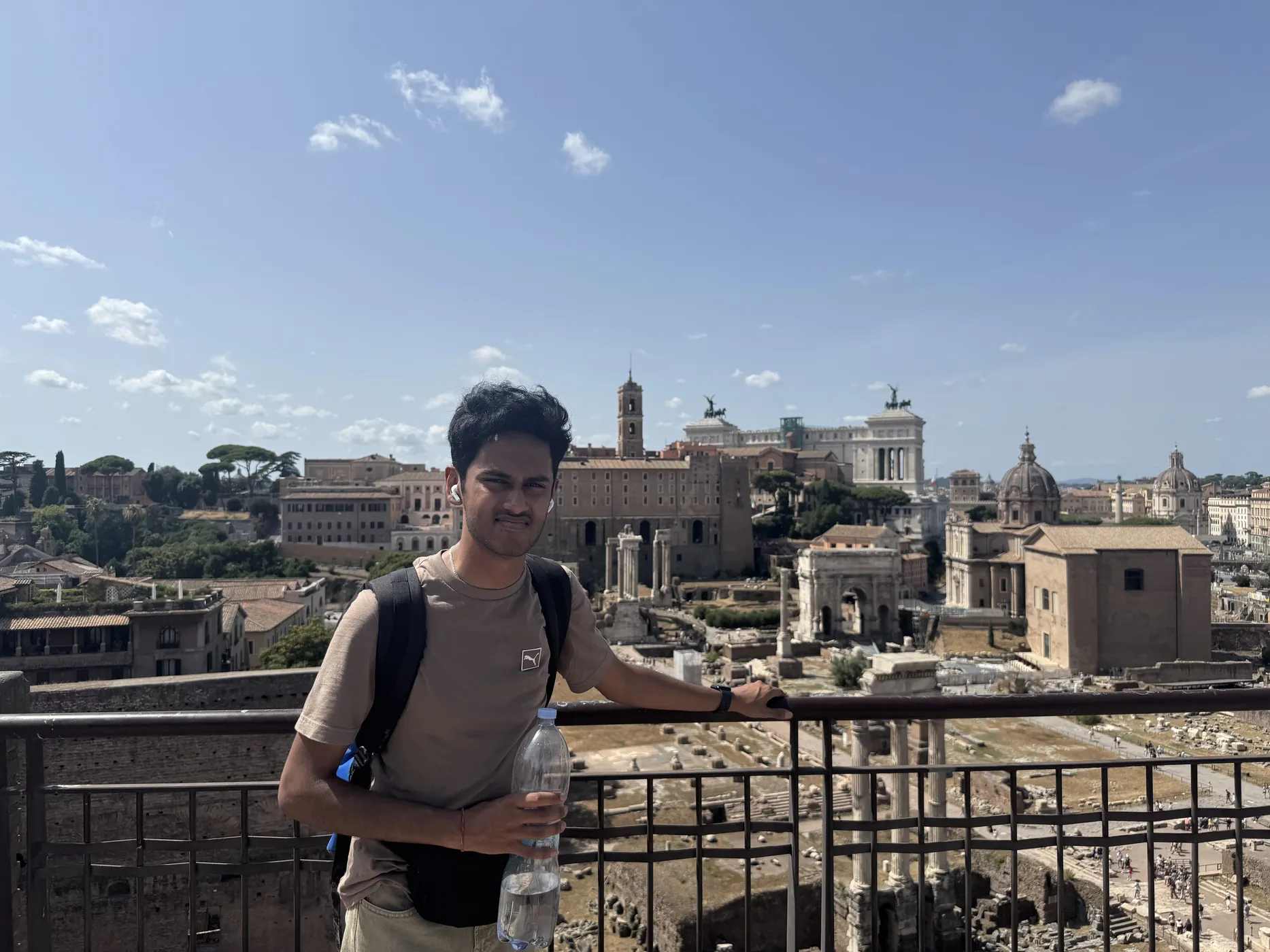Me at a railing above the Roman Forum